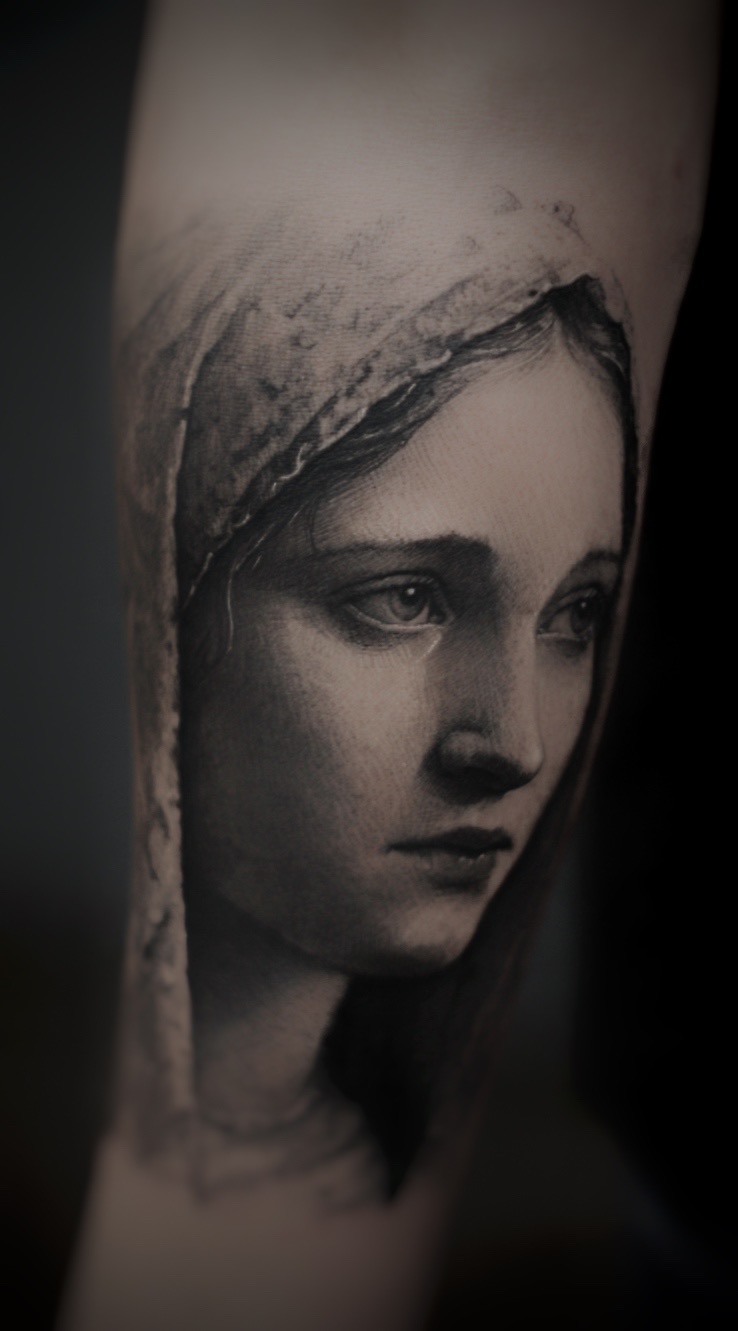 Black and grey Madonna portrait tattoo